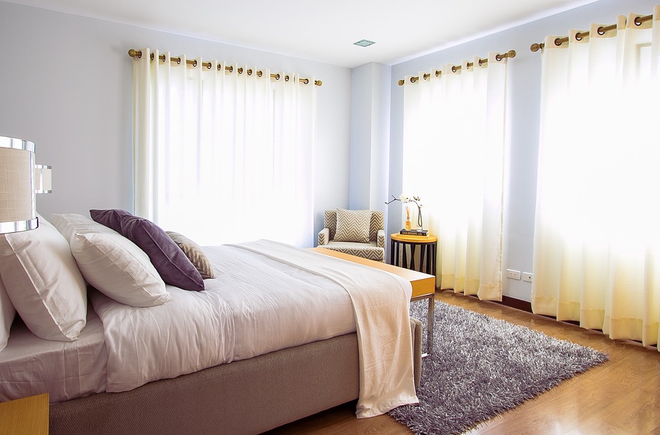Bed and rugs